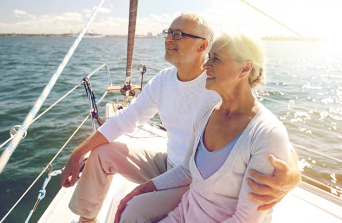 Couple Embracing on a Sailboat