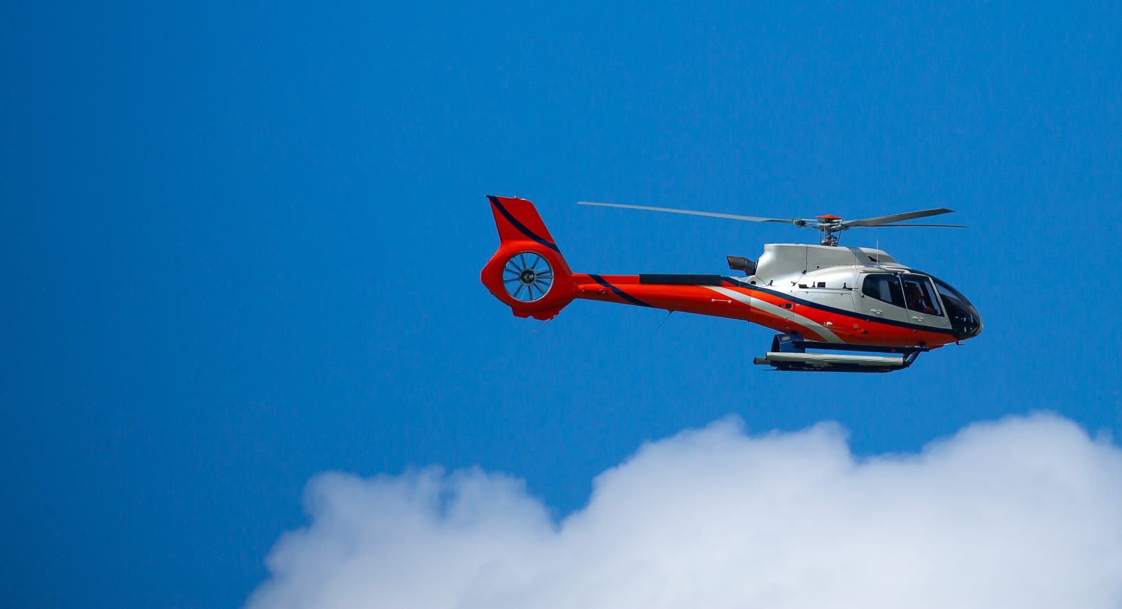 Emergency helicopter in in front of a blue sky